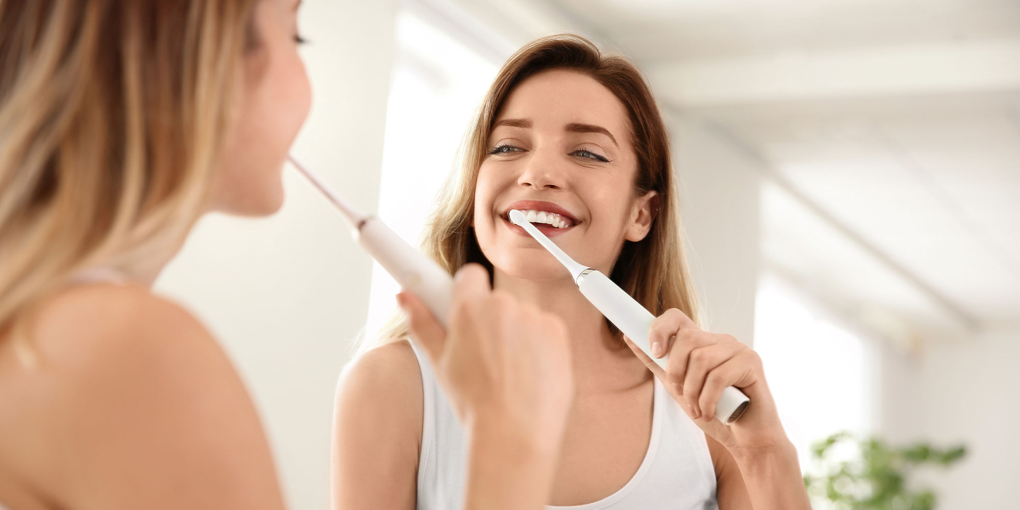 person brushing their teeth
