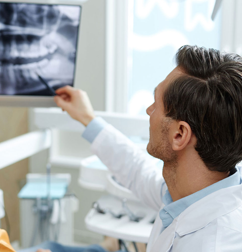 doctor pointing at screen