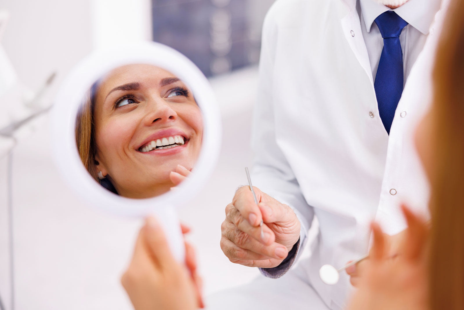 full mouth recon work being shown in mirror