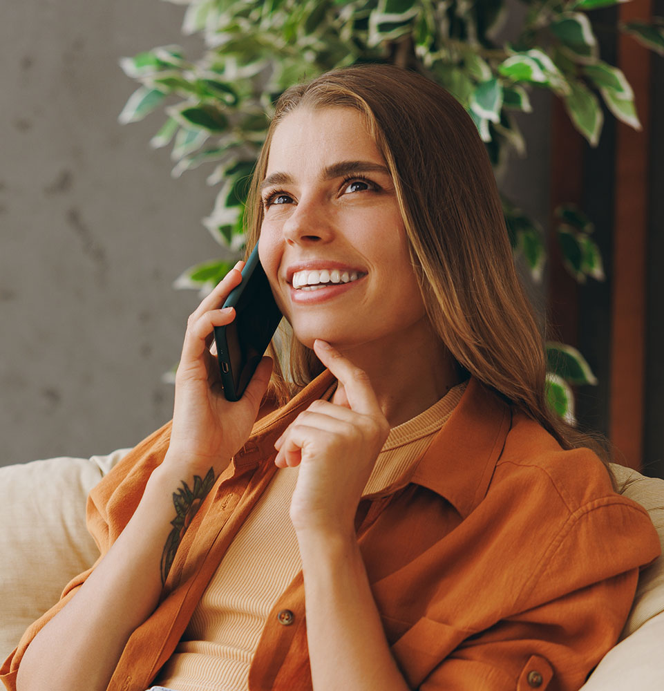 lady making appointment for cosmetic dental services