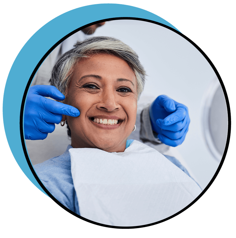 person with new full arch dental implants