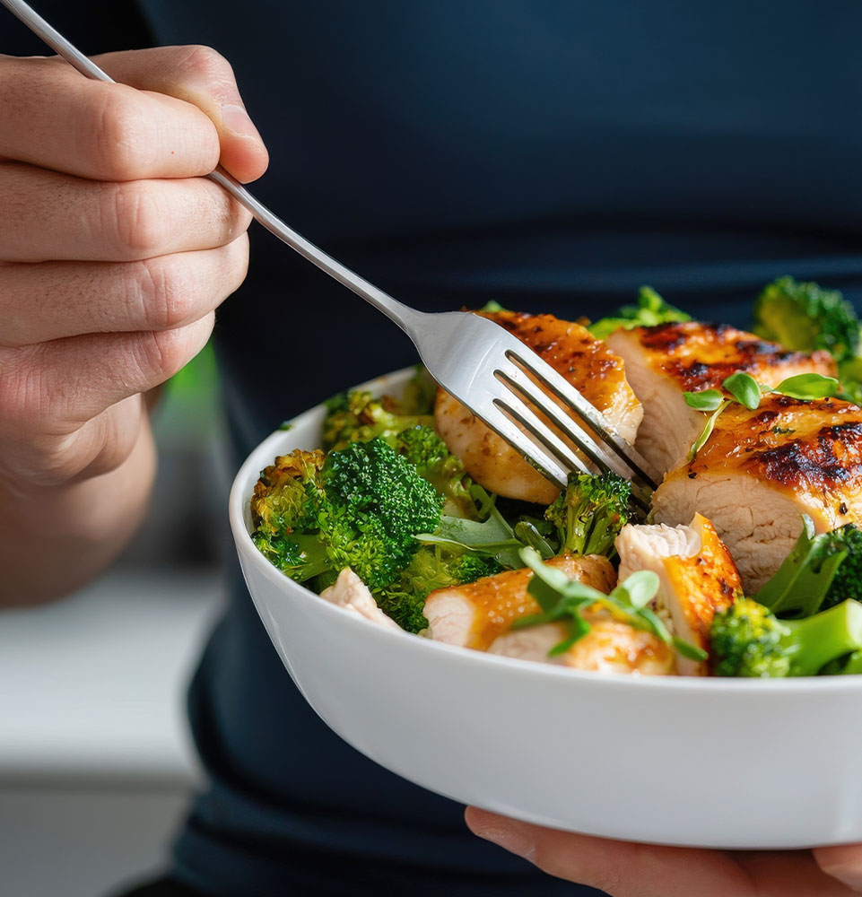 person eating healthy salad