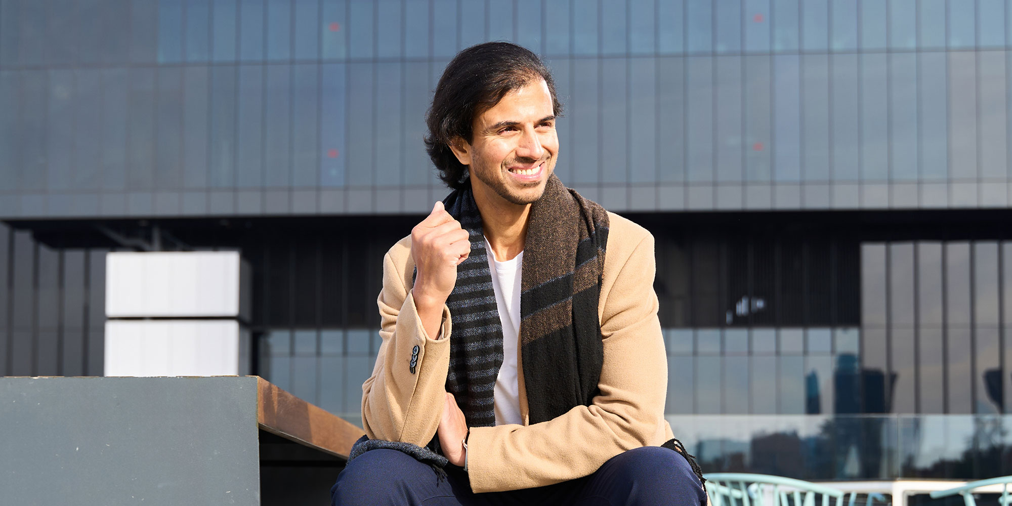 smiling man in city after dental work